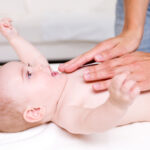 massaging of newborn baby